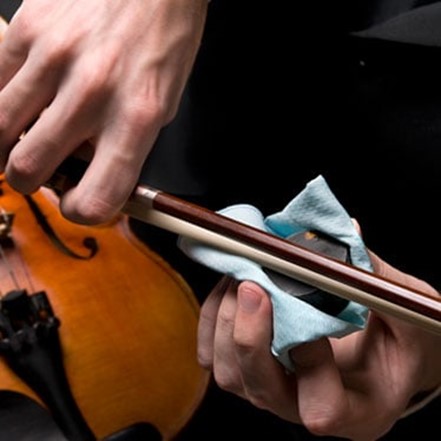 What is the purpose of applying rosin to your violin bow?